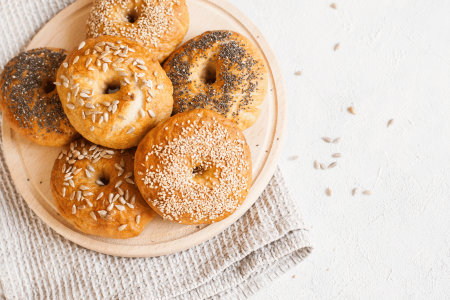 plate of bagels sitting on a towel