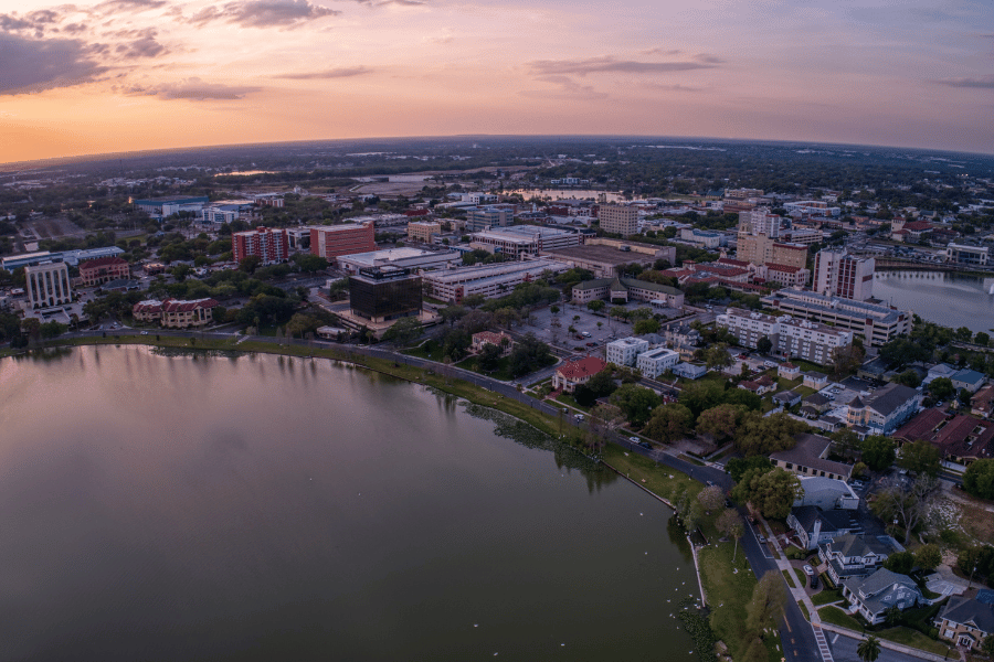 Aerial view of Lakeland, FL during the sunset near the lake