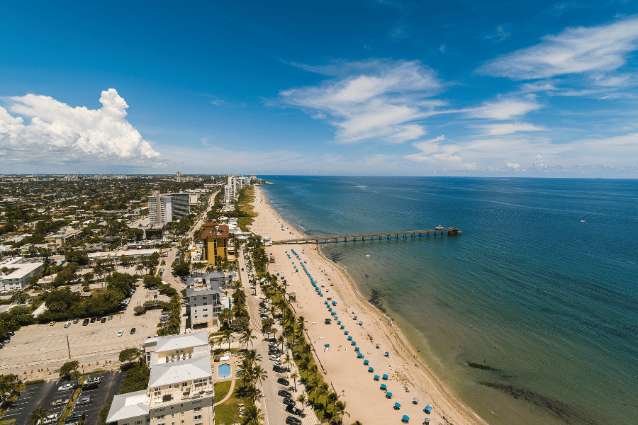 Aerial view of Deerfield Beach in Florida with beautiful water on a sunny day