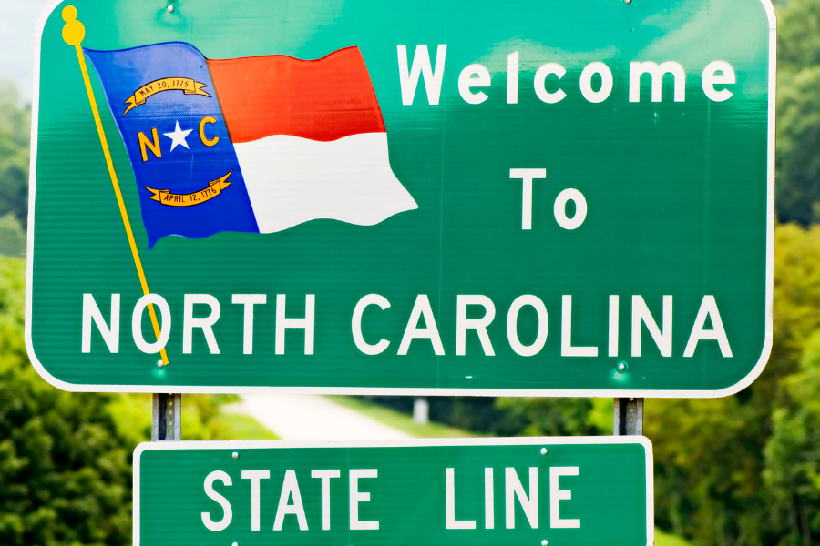 Welcome to NC state line sign on highway
