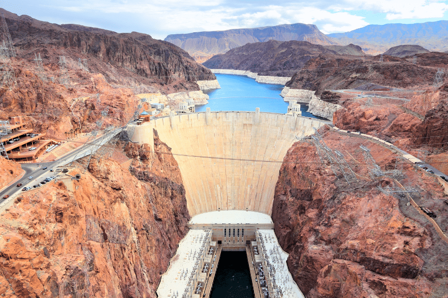 The Hoover Dam in Boulder City, NV surrounded by beautiful mountains 
