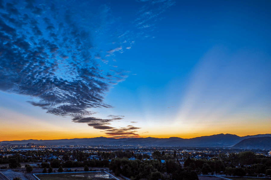 Sparks, NV during the beautiful orange sunset with mountains in the background