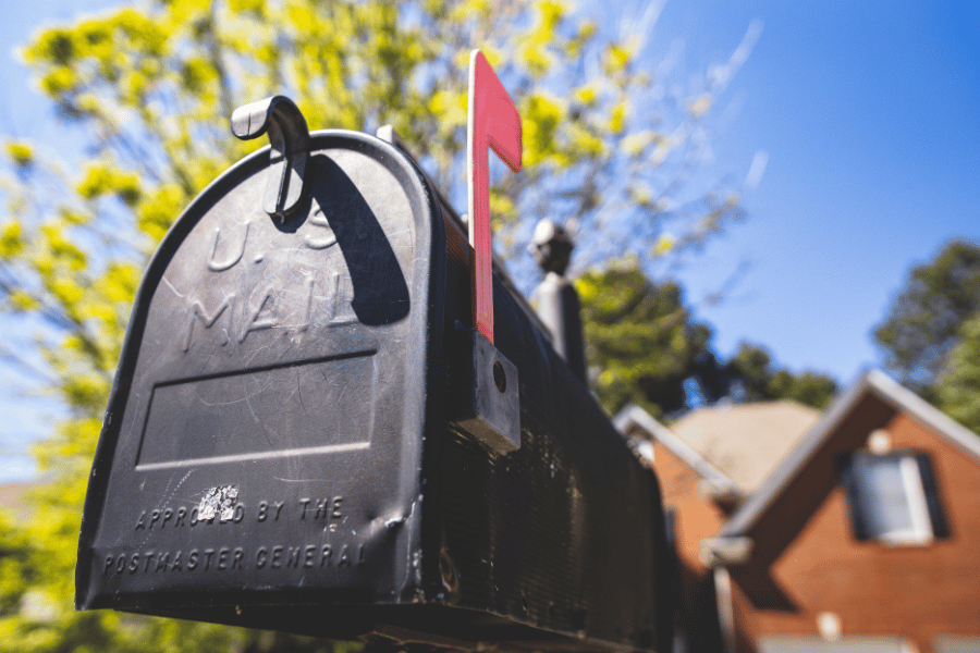black mailbox with flag up 