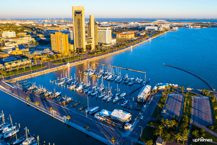 Corpus Christi TX Downtown with buildings and water Corpus Christi Texas downtown buildings and water with boats