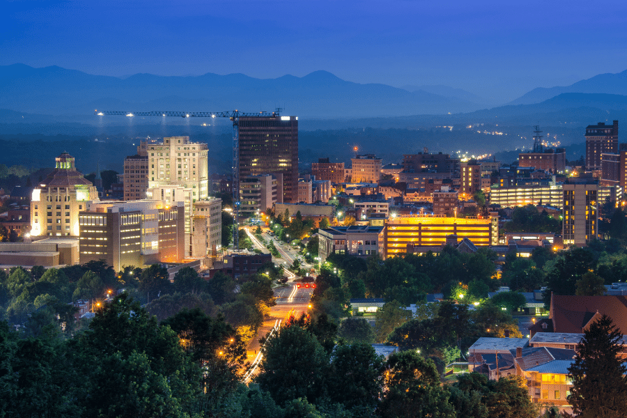 Downtown-Asheville.png A photo of the downtown city skyline of Asheville NC at sunset