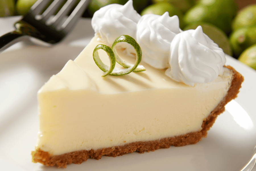 Key lime pie slice of key lime pie with whipped cream
