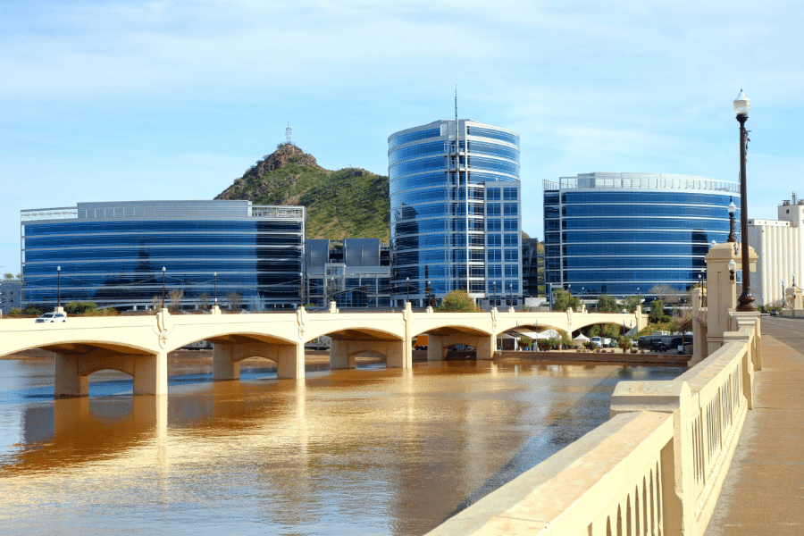 Bridge in Tempe, Arizona near the city and the water during a sunny, clear day 