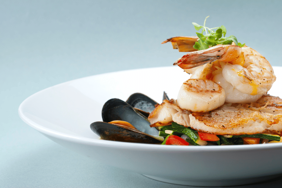 Seafood Image of seafood dish at a restaurant with clams and shrimp
