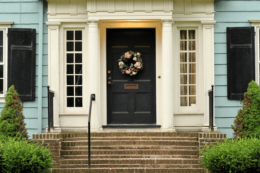 Pittsburgh Home Image of house front steps and door with wreath on front door