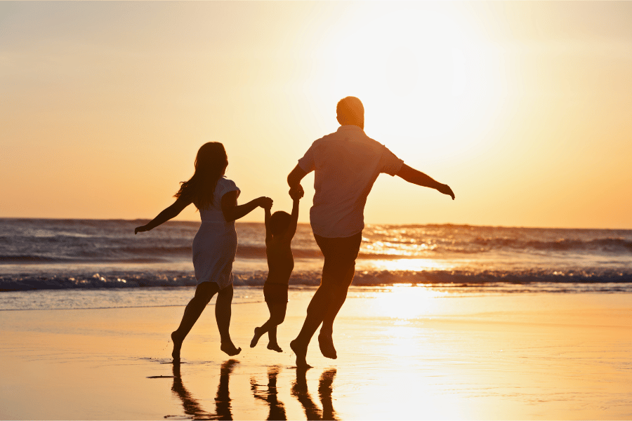 Family enjoying an evening at the Pensacola Beaches