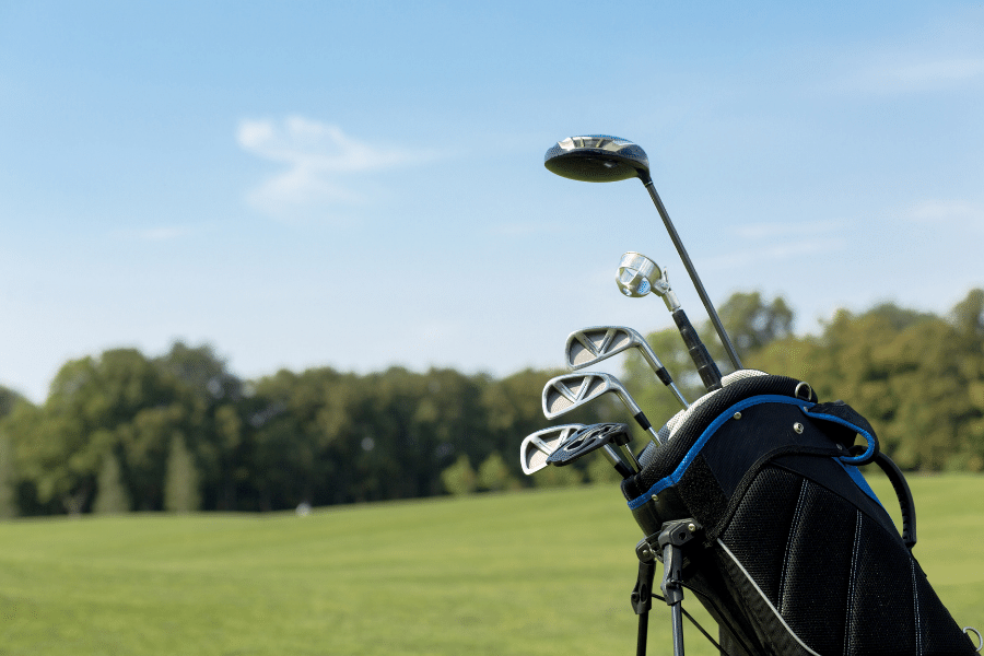 Golf-bag.png golf bag on a golf course on a sunny day