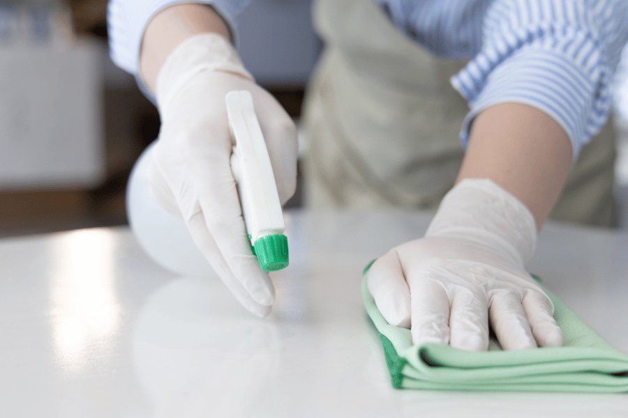 Cleaning with gloves and towel 