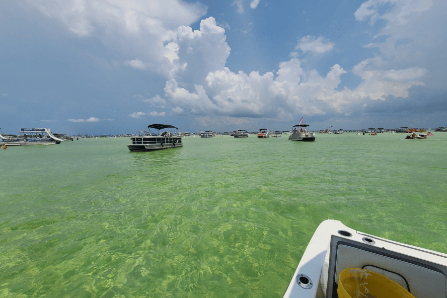 Crab Island Destin, Florida Boats and Beautiful Emerald Green Water at Crab Island in Destin, FL