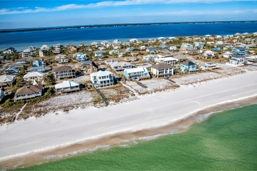 Pensacola, FL Beachfront Pensacola Homes on the beach on a sunny day
