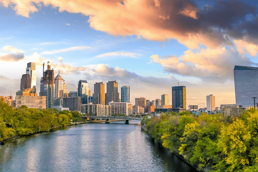 Pennsylvania Image of river with green landscaping with city skyline