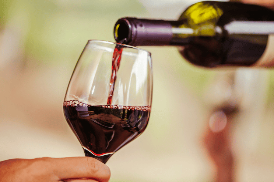 Glass of Red Wine Pouring red wine into a glass