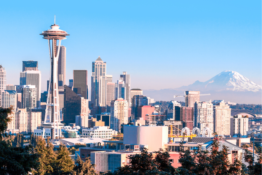 Seattle-WA.png The city of Seattle, WA on a sunny day with the mountains in the background