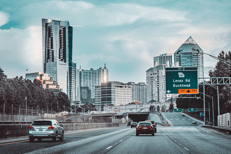 Cars on highway in Atlanta buildings in background