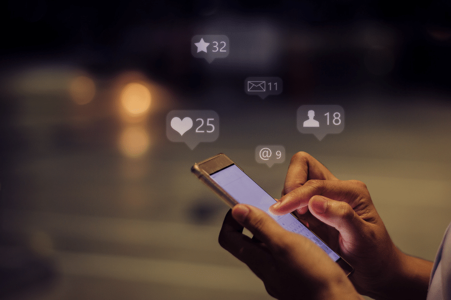 Social-Media.png Using social media on a smartphone