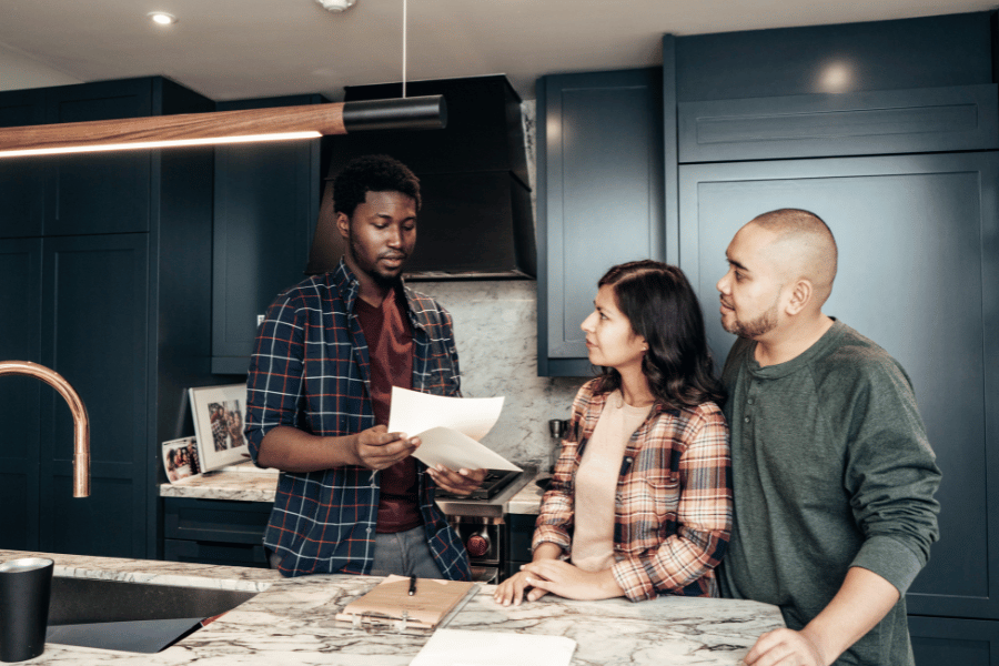 deciding-whether-to-buy-rent.png Deciding whether to rent or buy while talking with a professional in the property