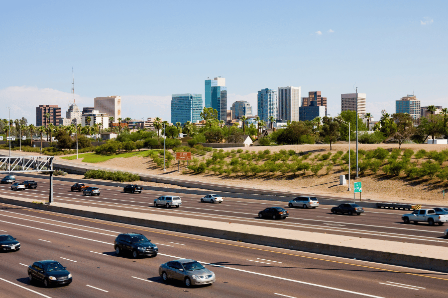 Phoenix-AZ-cars.png cars driving on highway in Phoenix, AZ