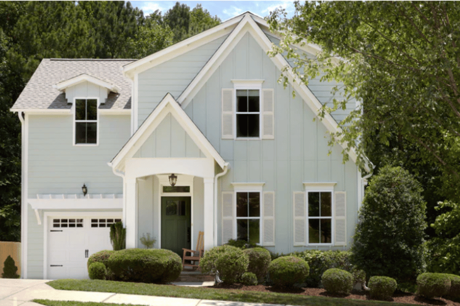 Exterior Paint Exterior paint on a house with white shutters