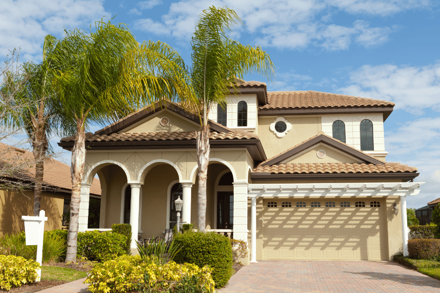 Palm Coast, Florida home for sale with palm trees in front yard