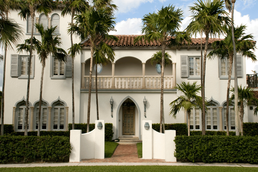 West Palm Beach Luxury Home White luxury home with palm trees in West Palm Beach, FL