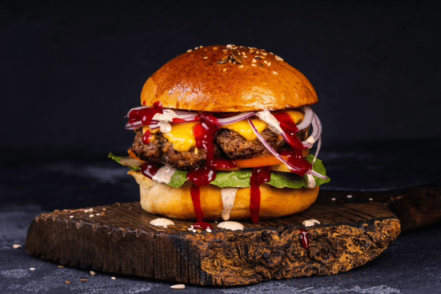 burger cheese bun beef ketchup tomato lettuce