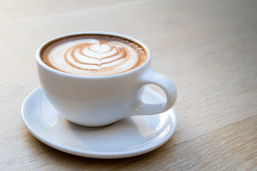 Cup of coffee Cup of coffee in white mug with latte art