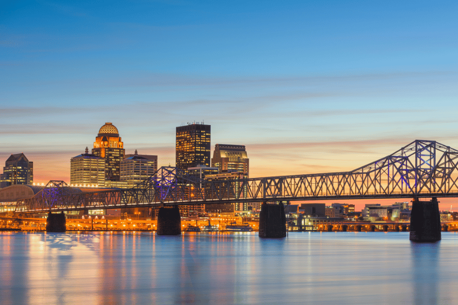 Bridge into Louisville during orange sunset