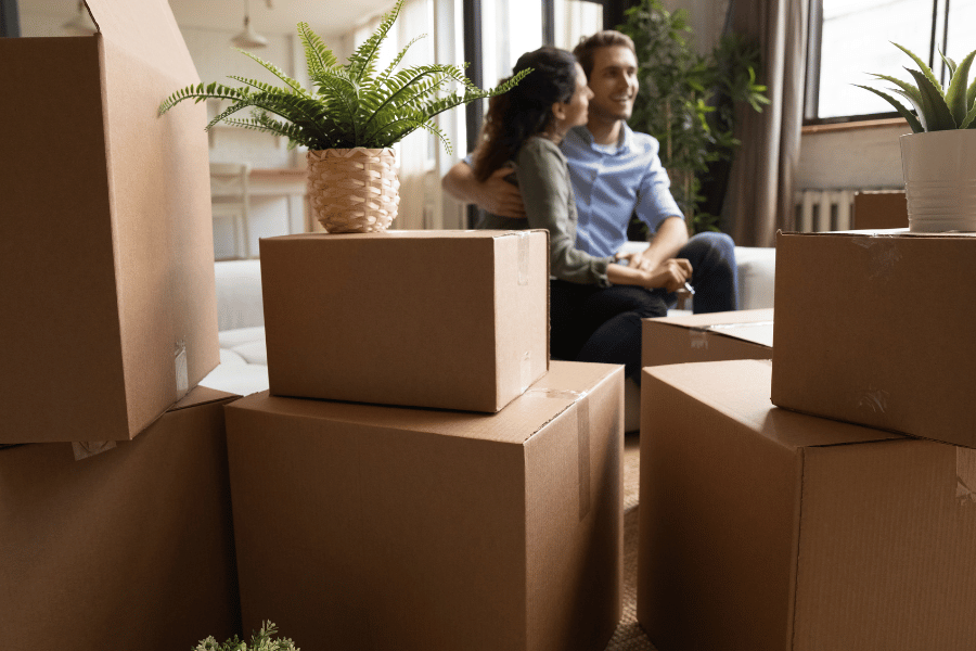 couple-preparing-to-move-to-home.png Preparing to move with boxes
