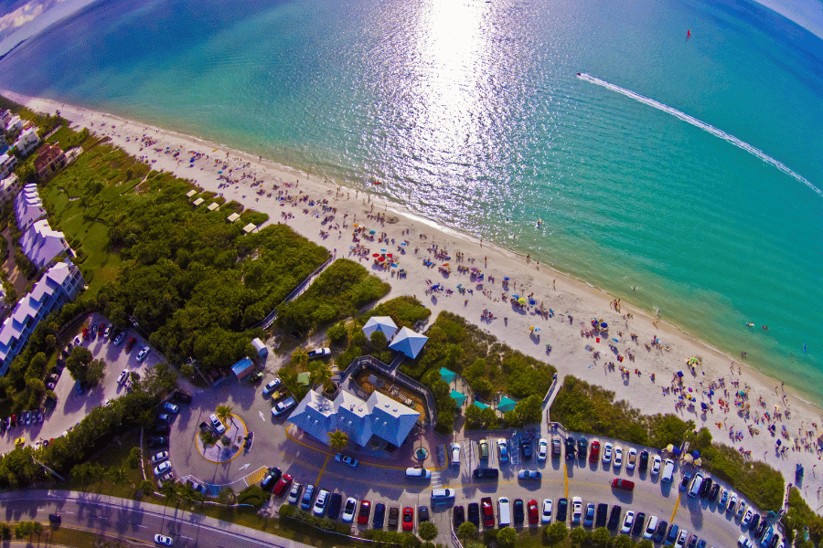Bonita Beach Bonita Beach with lots of people on the sand near the blue water